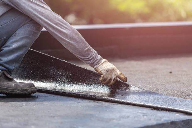 Professional Waterproofing technician working in Athens, IL